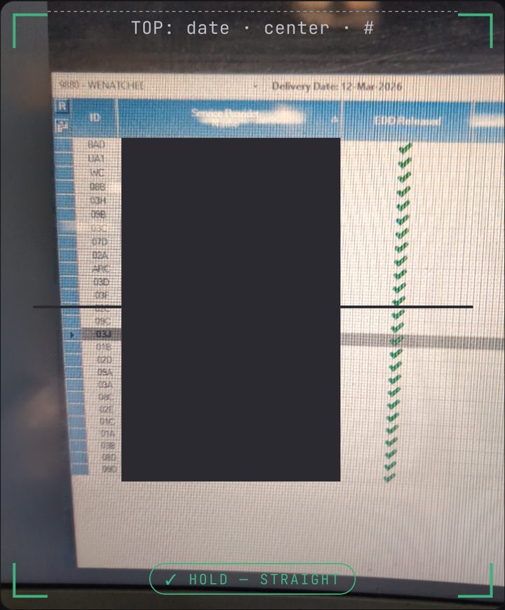 Photo 1 of the dispatch screen: the center and date at the top, then the ID and name columns, every row. Names are covered.